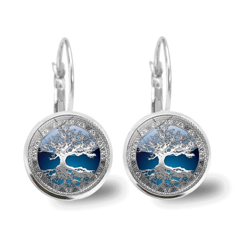 Sylvara™ | Silver Tree of Life Hoop Earrings" can be rewritten as:
"Sylvara™ | Silver Hoop Earrings with Tree of Life Design